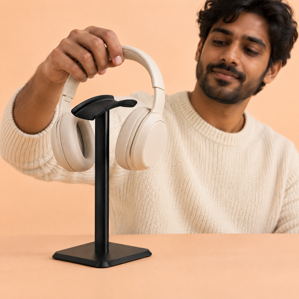 Black aluminium headphone stand in use