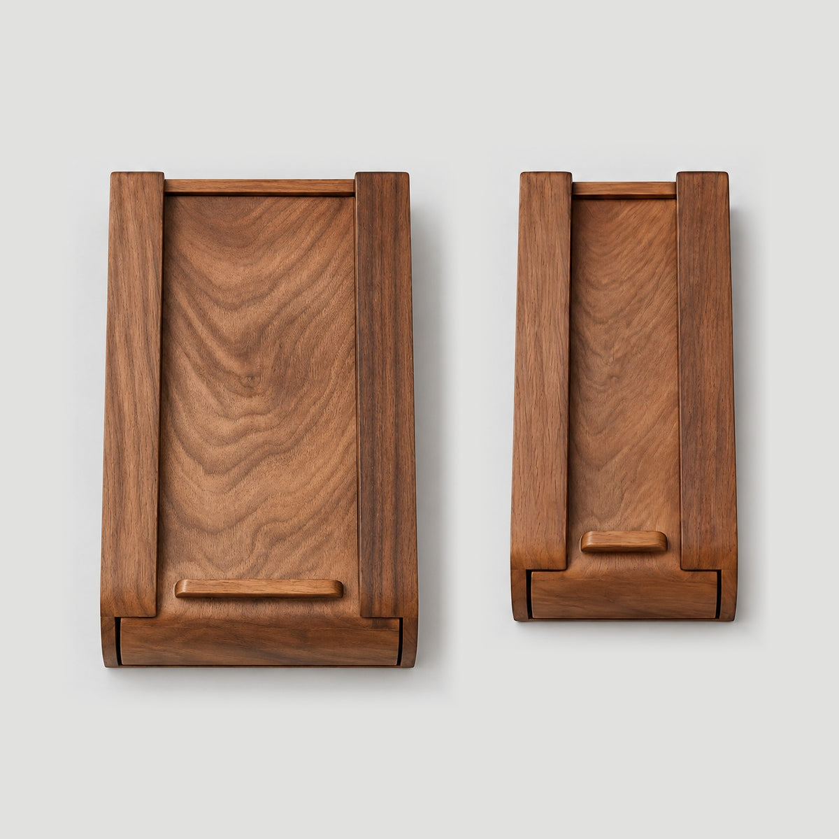 Large and small walnut Glide drawers side by side, turned over, at true relative size