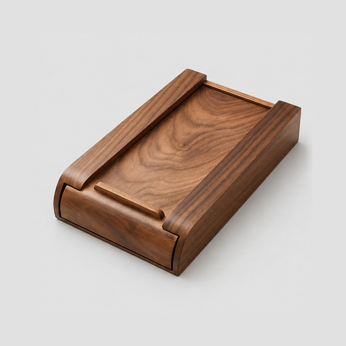 Large walnut Glide drawer turned over to show its pull bar and curved front