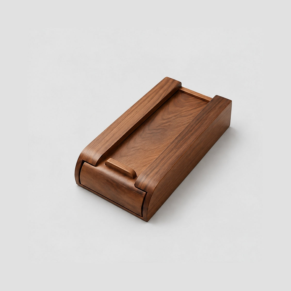 Small walnut Glide drawer turned over to show its pull bar and curved front