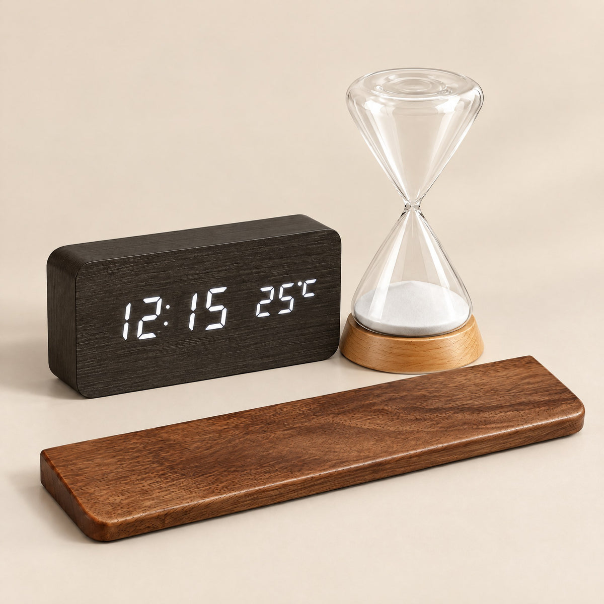 Wood-effect alarm clock, glass hourglass and walnut wrist rest