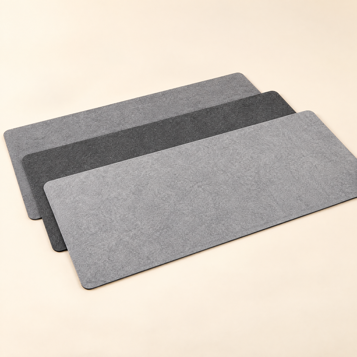 Felt desk mat in grey, dark grey and light grey