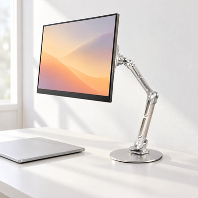 Reach stand in silver holding a portable monitor on a white desk