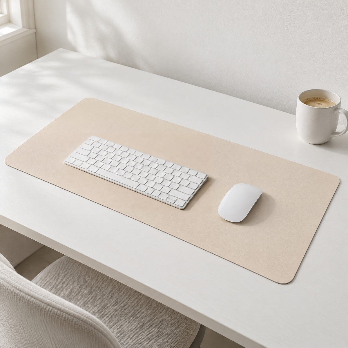 Flow desk mat in eggshell with a white keyboard and mouse on a white desk