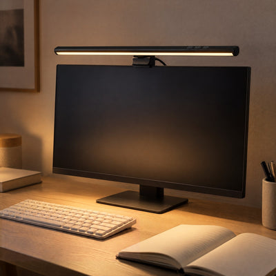Crest light bar lighting an open notebook on a desk in the evening