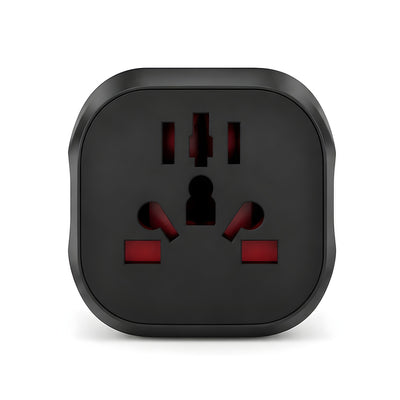 Front view of the Layover travel adapter's universal socket with red shutters inside