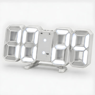 3D LED digital clock in white with white light, on its fold-out stand