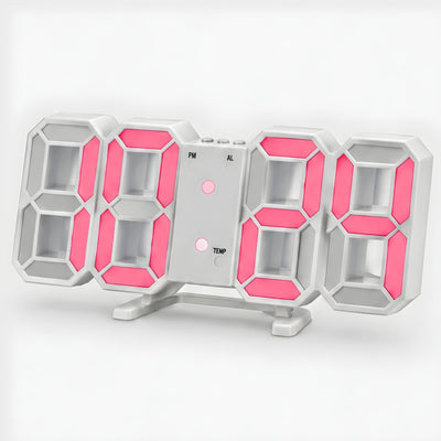3D LED digital clock in white with pink light, on its fold-out stand