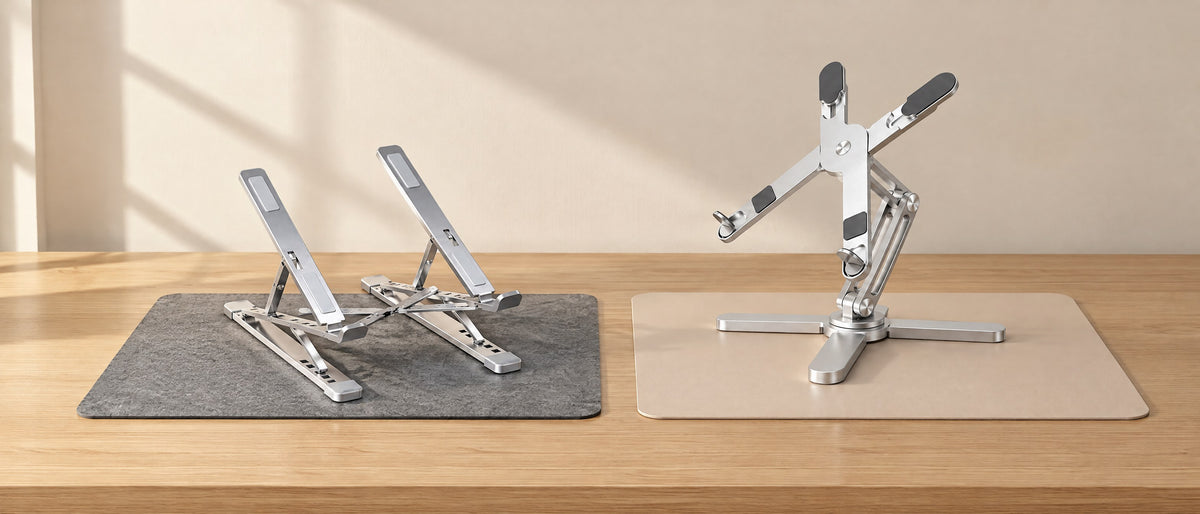 Folding and rotating aluminium laptop stands on felt and faux leather desk mats