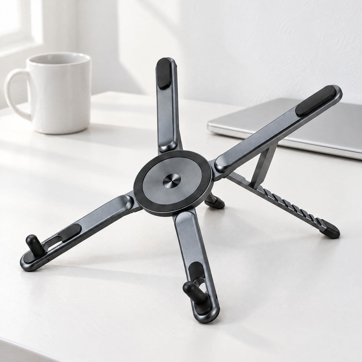 Span stand open as an X, with its magnetic disc, rear supports and front stops